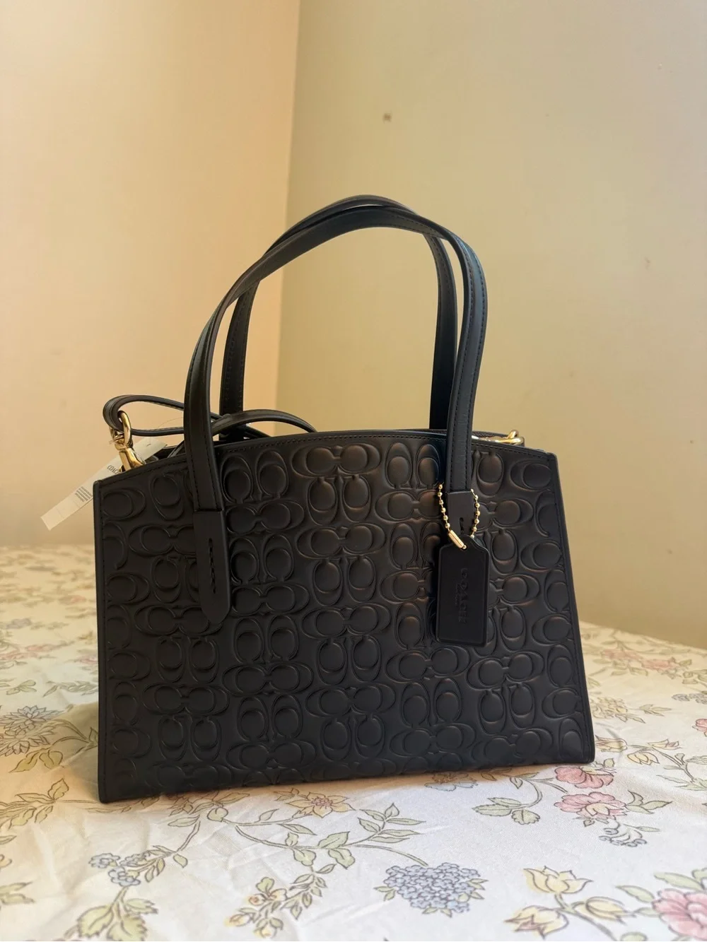 Coach Charlie Carryall 28 in Signature Embossed Leather